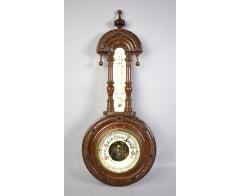 A Late Victorian Walnut Framed Aneroid Wall Barometer with Thermometer, Cracked Glass, 51cms High