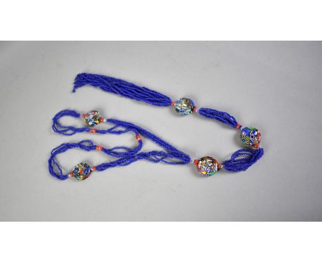 A Long Vintage Millefleur and Blue Glass Necklace comprising Six Large Flattened Oval Beads, Possibly Venetian