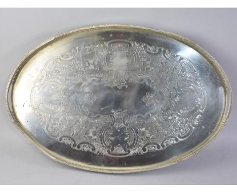 A Silver Plated Pierced Gallery Oval Two Handled Tray, 61cms Wide, Engraved Decoration
