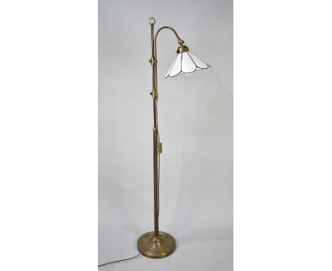 A Modern Rise and Fall Brass Standard Lamp with Mother of Pearl Effect Shade