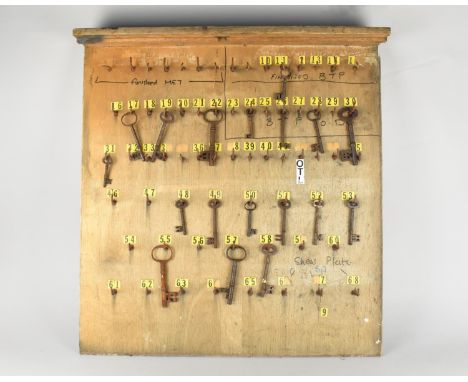A Vintage Wooden Key Hanging Board, Mid 20th Century with War Dept Crows Foot Stamp to Rear Containing Early 19th Century Doo