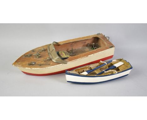 A Vintage Battery Operated Wooden Motor Boat Toy, Engine Stamped KS, together with a Modern Wooden Model of a Rowing Boat, 30