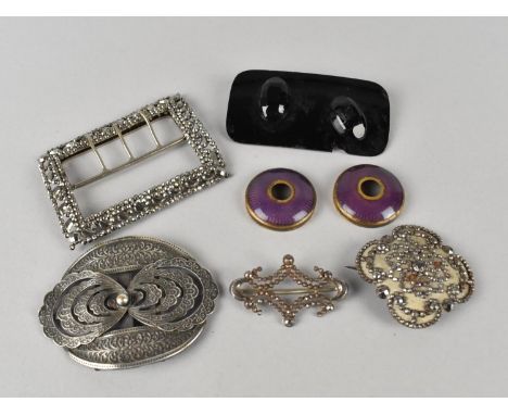 Three Early 20th Century Cut Steel Buckles, A Black/Purple Glass Example (AF) and Two Purple Enamelled Mounts with Engine Tur