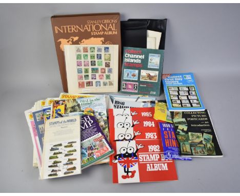 A Stanley Gibbons International Stamp Album and Contents together with Various Philatelic Collectors Booklets and Catalogues,