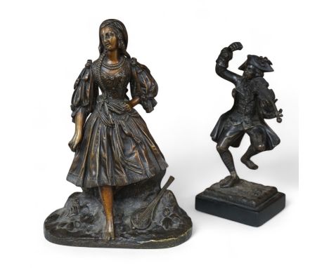 A small bronze figure of a male violinist and another bronze female figure with a lute against a rock, tallest 23cm high