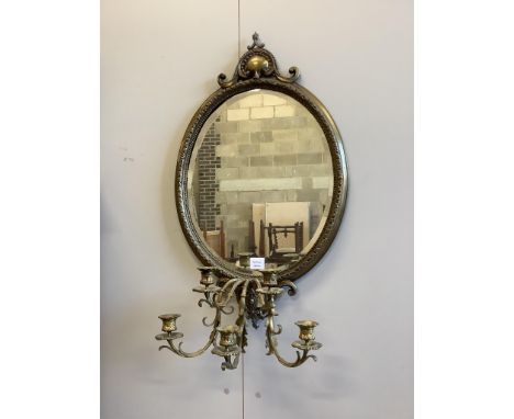 An early 20th century oval brass girandole wall mirror, width 52cm, height approx. 90cm