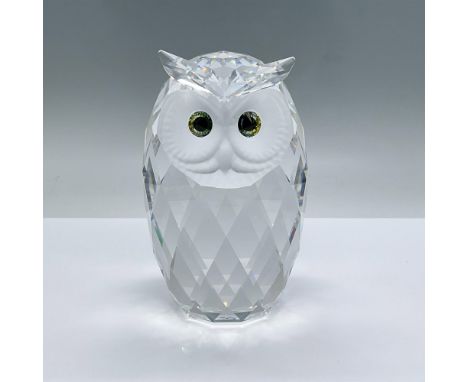 Charming lead crystal owl with a frosted face and sparkling green eyes. This piece comes with a polishing cloth and gloves. T