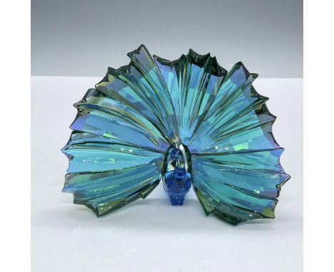 Depicting one of the most sacred and flamboyant birds, this breathtaking bird sparkling in a combination of blue, green cryst