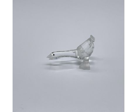 Part of the Barnyard Friends collection. A clear crystal goose with a frosted beak and feet. Black crystal eyes. This gosling