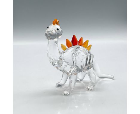 Part of the Fairy Tales collection this clear faceted crystal body figure has amber, orange and red crystal comb and plates. 