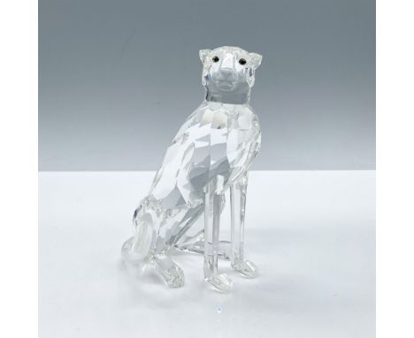 Stunning clear crystal with an alert expression and mesmerizing, amber-colored eyes. This variation features a high tail. Swa