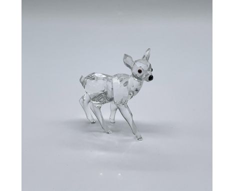 Part of the Rare Encounters collection. A baby deer made from a clear faceted body and smooth crystal legs. Black crystal for