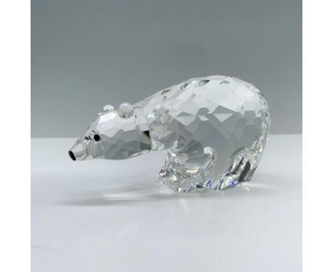 A large, round polar bear standing sturdily with its head held high, showcasing its striking black crystal eyes. Swarovski ba