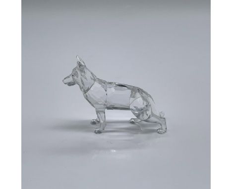 Part of the Pets Corner collection. A clear crystal figure of a dog with brown crystal eyes. Swarovski swan mark. This item h
