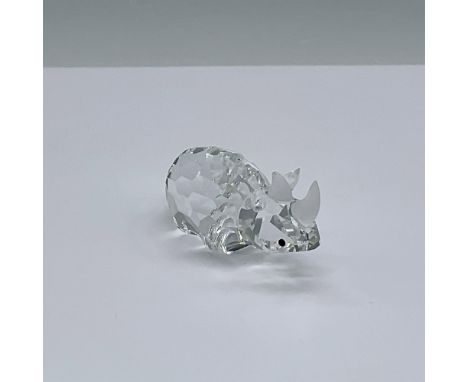 This Swarovski crystal small rhinoceros belonged to the African Wildlife group. The rhino is made from clear crystal, with bl