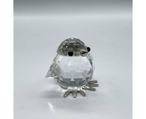 Clear crystal figure standing up with black crystal eyes and rhodium for the beak and feet. Swarovski backstamp. 10030. This 