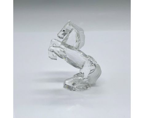 Part of the Parade collection made with clear crystal, and frosted tail and mane. Swarovski swan marking. This item has its o
