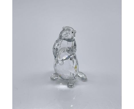 Part of the Woodland Friends collection. A clear crystal figure of a marmot with black crystal eyes. Swarovski swan mark. Thi