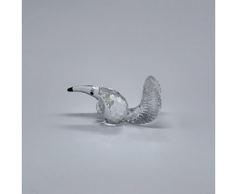 Part of the Endangered Species collection. A seated anteater made from clear crystal with black eyes and nose. Swarovski swan