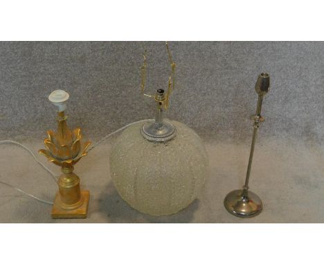 A bulbous glass table lamp, a carved gilt acanthus shaped table lamp and a single rosebud candlestick. H.60 (tallest) 