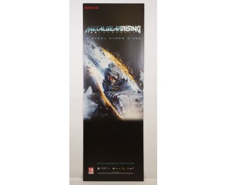 This lot features the official fold-out standee/point of sales material supplied to videogame stores for Meta Gear Rising Rev