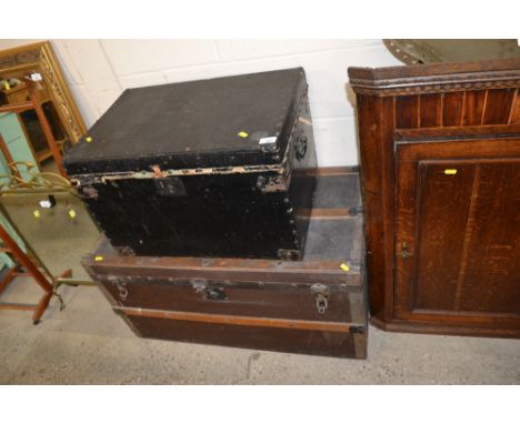 A wooden and metal bound trunk and a stud work trunk