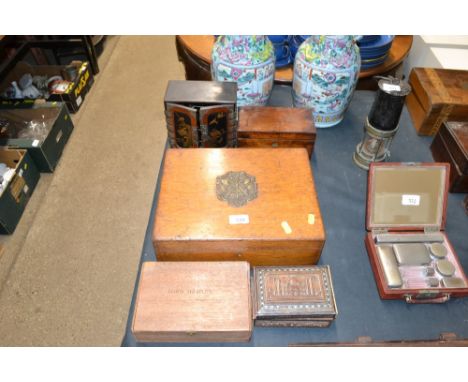 A quantity of wooden trinket boxes to include a bone inlaid example
