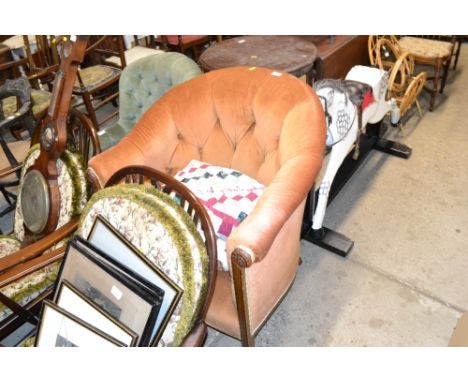 A button down upholstered tub chair 