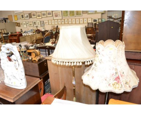 A brass and onyx standard lamp and shade 