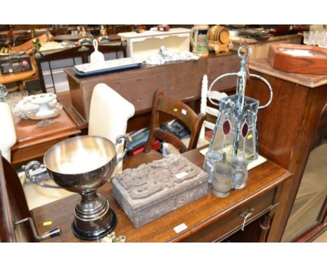 An Oriental box with carved dragon decoration; a silver plated trophy cup; a hanging leaded glass light fitting etc.