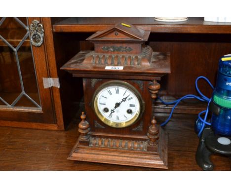A two hole mantel clock 