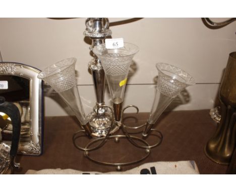 A silver plate epergne with three cut glass trumpets 