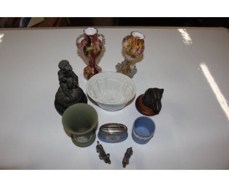 A white china jelly mould; a plated table lighter; a bronzed dog head; two coloured glass vases; two Wedgwood vases etc.