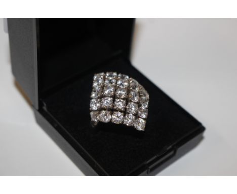 A large Sterling silver and cubic zirconia cocktail ring, size Q/R, approx. weight 7gms