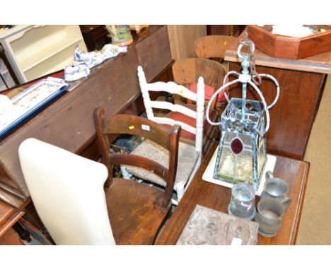 An elm seated bar back chair; a white painted ladder back chair; and a pair of vintage chairs 