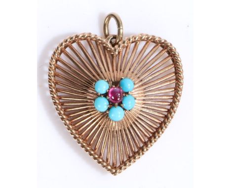 9 carat gold and gem set heart pendant, the heart is formed of multiple bands of gold radiating from a central cabochon ruby,