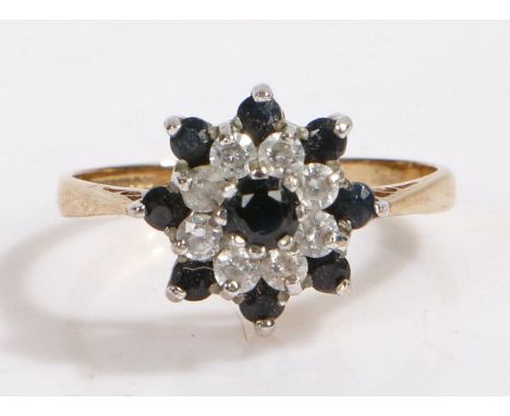 9 carat gold paste and black stone ring, the head in the form of a flower set with paste and black stones, ring size K weight