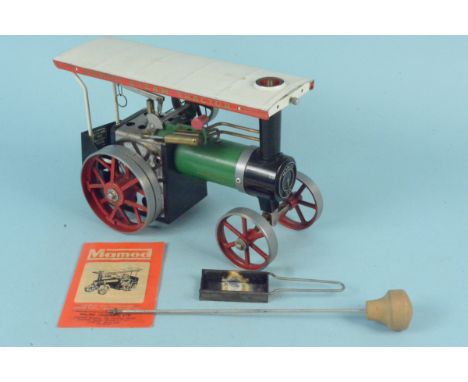 A vintage Mamod steam tractor with accessories (used but clean)