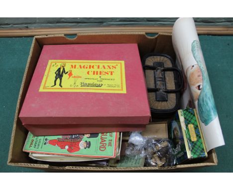 A box of mixed games and toys including boxed 'Magicians Chest', a tin of vintage die cash vehicles etc