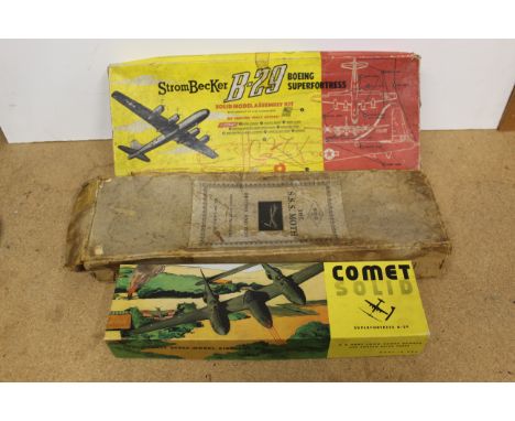 Three vintage airplane model kits including 'Strombecker' B-29 Boeing Superfortress (appears complete), a Comet Solid B-29 (a
