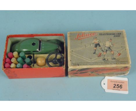 A vintage boxed Schuco Telesteering Car 300 car and accessories 