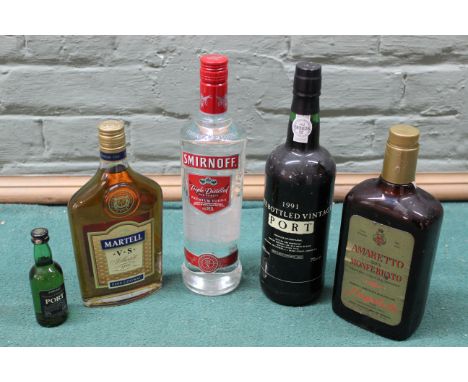 A bottle of 1991 vintage port plus a Martell cognac, a bottle of Amaretto and a Smirnoff vodka