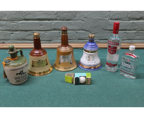 Two bottles of vodka, a Wade Bells 2000 Queen mum whisky, a Wade Bells decanter, a Ben-eagles whisky golf ball and two empty 