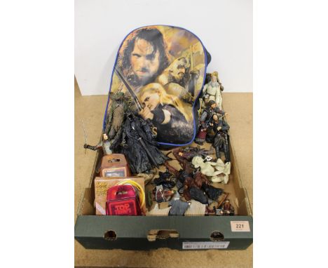 A Lord of the Rings collectors back pack plus a selection of Rings figurines and game cards