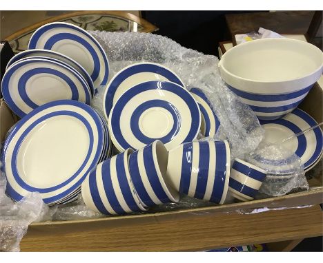 A selection of Cornishware to include tw dinner plates, two smaller plates, twleve saucers, a pudding basin, seven side plate