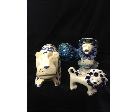 A selection of ceramic lions, two made in the USSR and a Moorland pottery one.