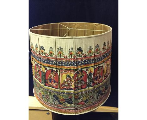 Antique Indian artefact converted to a standard lamp with shade.