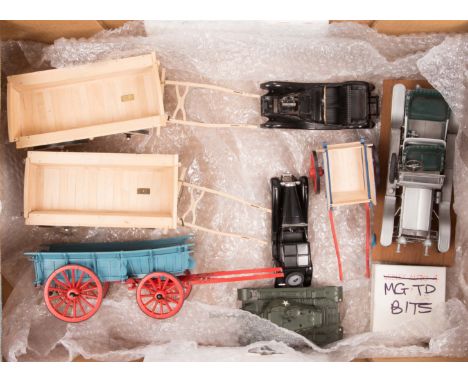 4 Wills Finecast factory produced wooden farm waggons. Made by Ron Platt. All approx 1:24 scale, 3 as 4-wheeled examples with