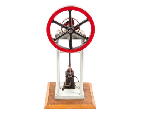A live steam stationary engine. A single cylinder vertical engine (cylinder dimensions; 40mm x 70mm). Built to a high standar