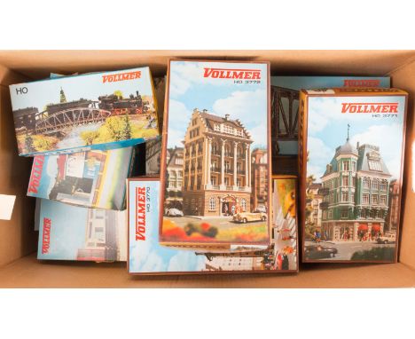 12 HO gauge railway lineside unmade plastic kit buildings and accessory packs by Vollmer. Well detailed kits for continental 